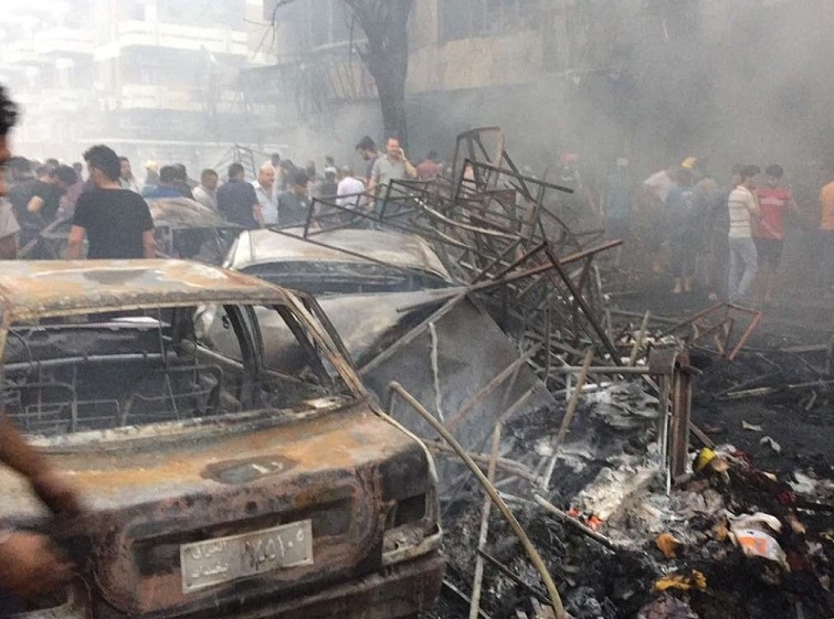 أكثر من 200 شخص بين شهيد وجريح في عملية ارهابية لداعش التكفيري بالكرادة  + (صور)