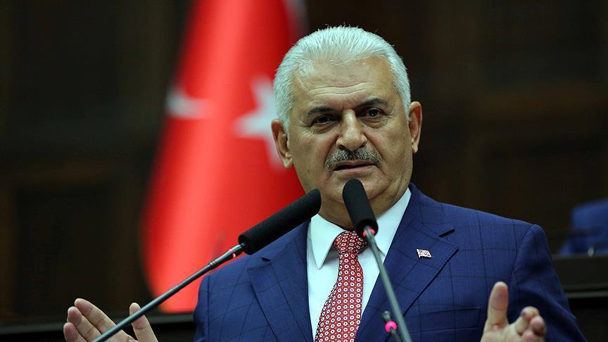Turkey PM says aims to develop relations with Syria, Iraq