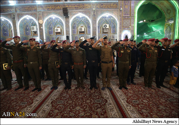 ضباط عراقيون يؤدون قسم الولاء عند مرقد الامام الحسين (ع) + (صور)