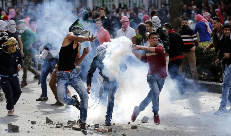 اصابة 13 فلسطينيا برصاص الاحتلال الاسرائيلي قرب رام الله