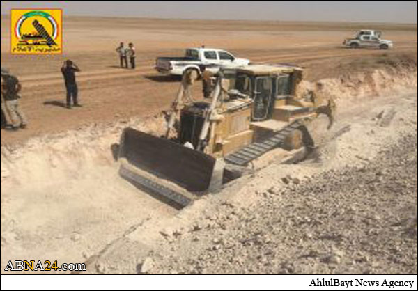 انشاء خندق وساتر حول محافظة كربلاء لمنع تسلل الارهابيين والمفخخات + (صور)
