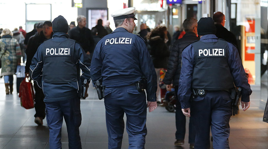 After attacks, German minister rejects blanket suspicion of asylum seekers