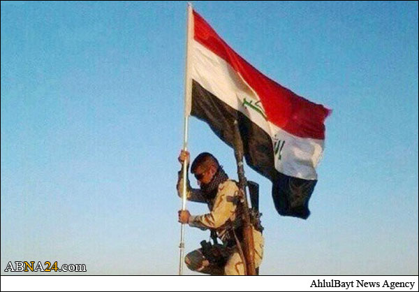 مجهولون يرفعون العلم العراقي فوق مسجد البغدادي وسط الموصل