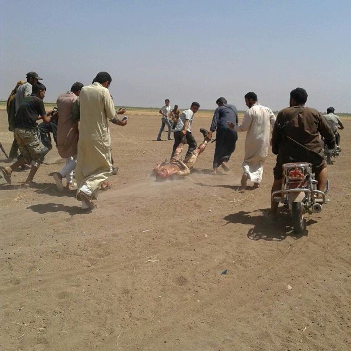 Russian Helicopter crashes in Syria's Idlib; rebels savagely desecrated pilot by dragging his corpse on ground / Graphic
