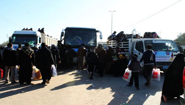 ISIS attack buses carrying displaced persons out of Tikrit, Iraq