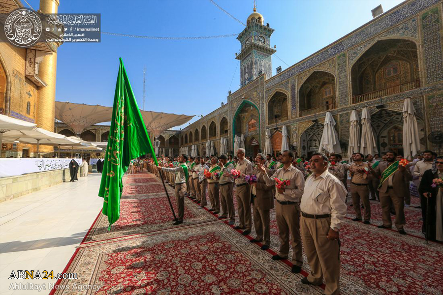 تقرير مصور / خدام حرم امير المؤمنين (ع) يحتفلون بولادة الامام الرضا (ع)