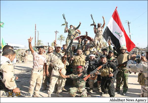 الحشد الشعبي يتوعد بملاحقة المدعين بالانتماء اليه وينفي وجود نساء مقاتلات في صفوفه