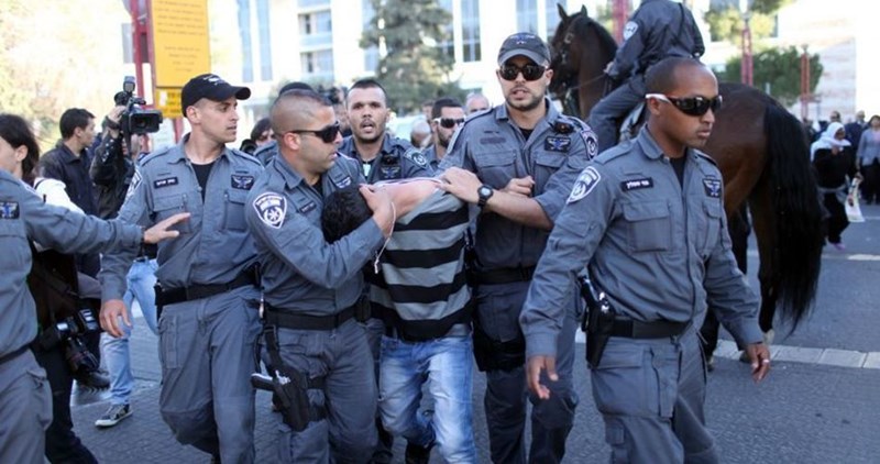 IOF arrests 13 Palestinians in Occupied Al-Quds