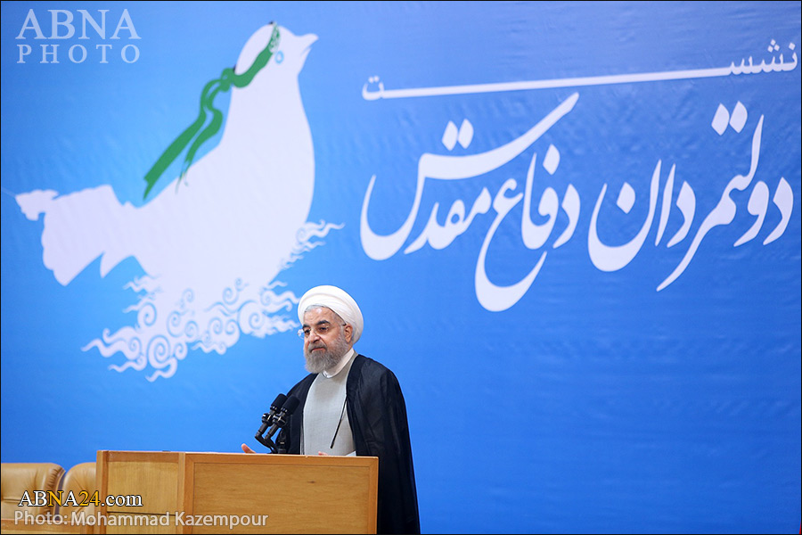 Iran President meets Sacred Defense commanders at Tehran's Islamic Summit Conf. Hall