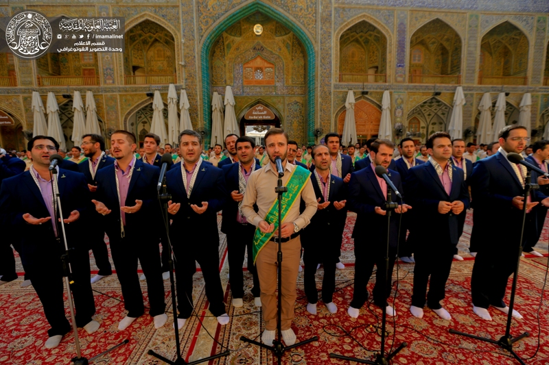 Photos: The servants of Imam Ridha Holy Shrine proud to perform the visit ceremony in Imam Ali Holy Shrine
