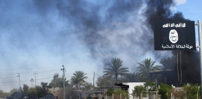 Unknown armed men burn ISIS publishing house in Mosul