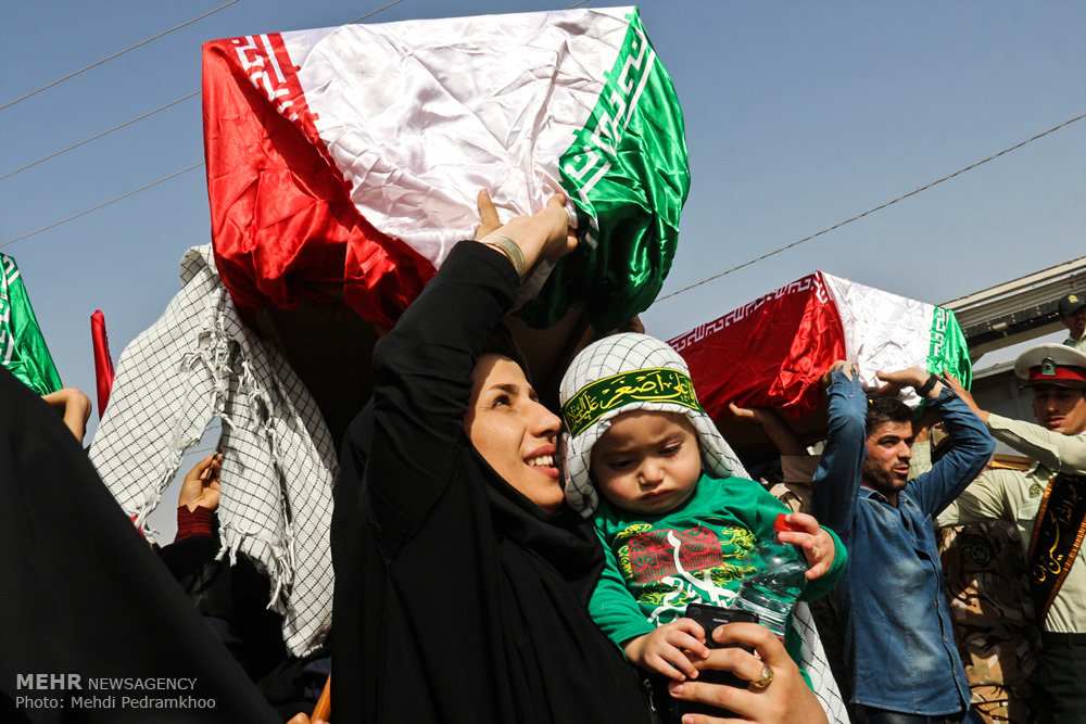 تصویری رپورٹ: شلمچہ سرحد پر دفاع مقدس کے 78 شہیدوں کا استقبال