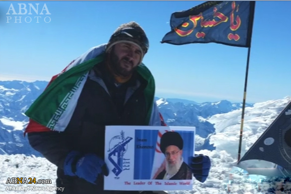 تقرير مصور / رفع راية الامام الحسين (ع) في أعلى قمة بقارة أوروبا