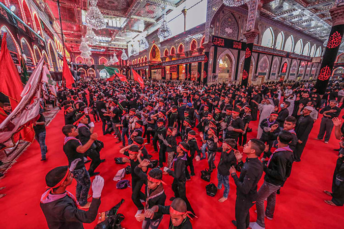 جمعية كشافة الامام الحسين(ع) تقيم مسيرة عاشورائية في كربلاء +(صور)