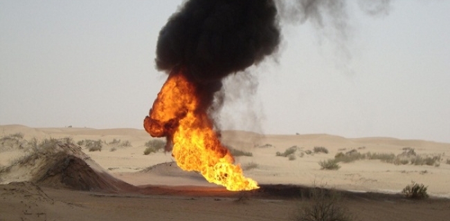 ISIS explodes two oil wells in southern Mosul