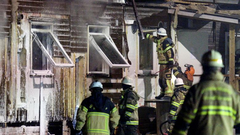 Swedish police investigate fire at asylum center / Pics
