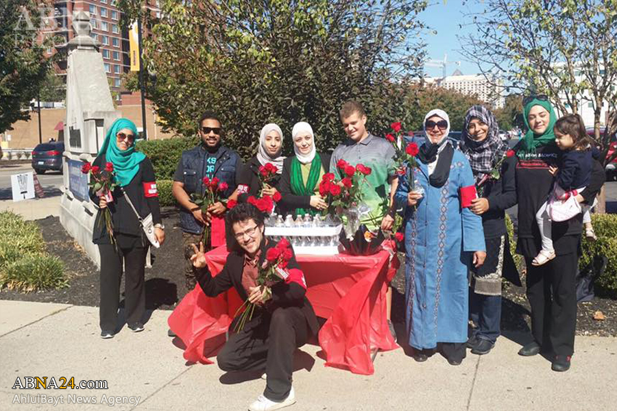 تقرير مصور/ نشطاء جمعية "من هو الحسين (ع) ؟" توزع نشرات ثورة الامام (ع) في كنتاكي الامريكية