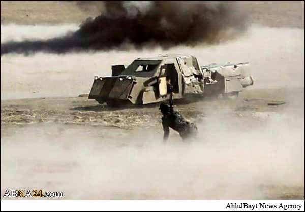 الحشد ينشر فيديو لشرطي يستهدف عجلة مفخخة بالموصل+ (فيديو& صورة)