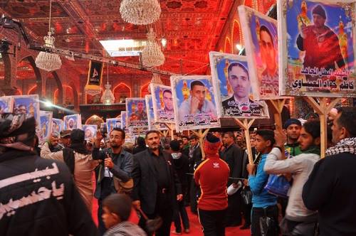 شهداء الحشد الشعبي يشاركون في زيارة الأربعين + (صور)