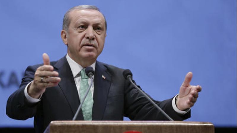 Erdogan warns NATO on sheltering 'terrorist' soldiers