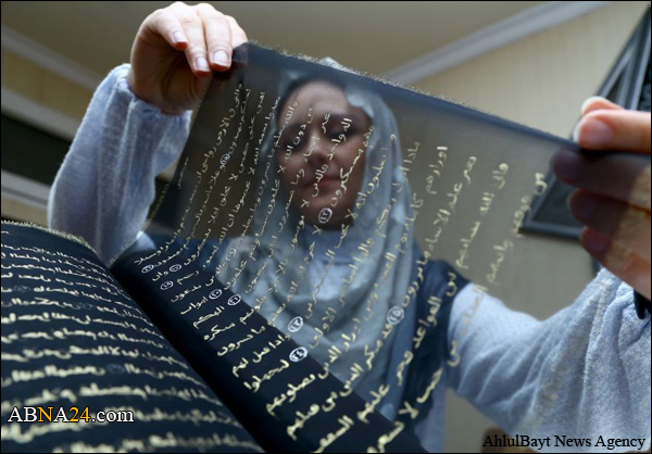 فنانة أذربيجانية تنجز أول مصحف مكتوب على الحرير في العالم + (صور)