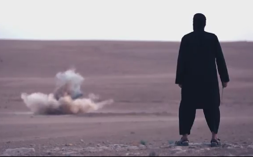 اعدام شاب كردي بقنبلة محلية الصنع في حقيبة تحمل على الظهر + (صور)