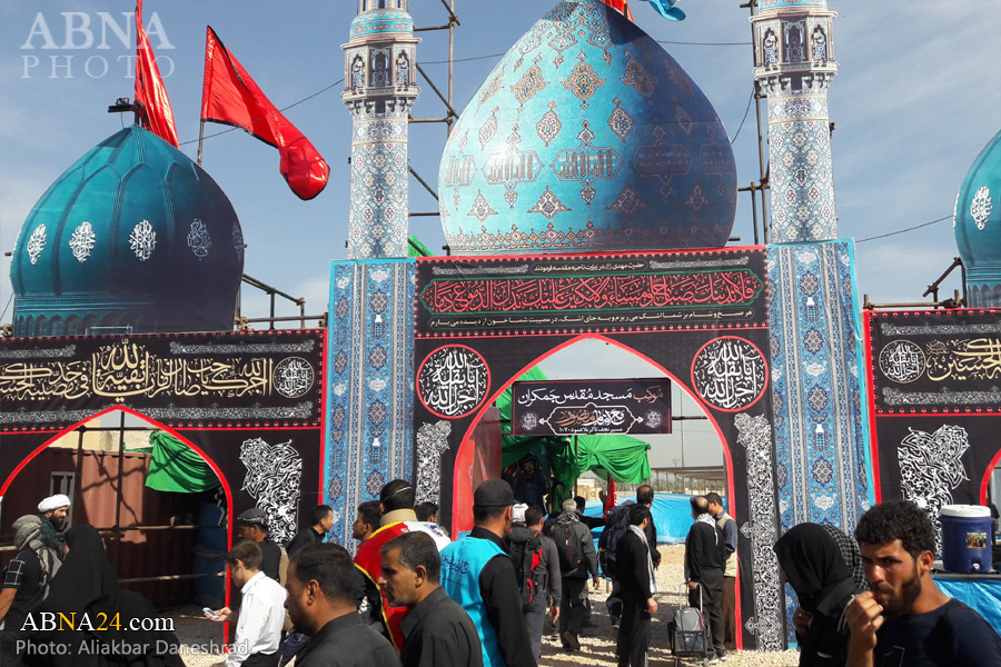 تقرير مصور/ مواكب حسينية ايرانية تقدم خدمات لزوار أربعينية الامام الحسين (ع)