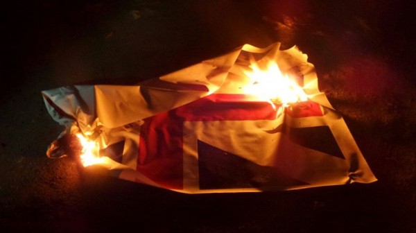 Bahrainis burn British flag in protest against UK PM’s Bahrain visit
