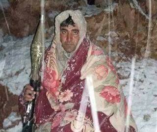 تقرير مصور/ مقاتل للحشد الشعبي صامد أمام البرد ويكافح داعش في الموصل
