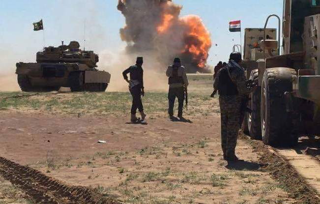 الحشد الشعبي يصد تعرضا لداعش ويفجر “شفلا” وعجلة مفخختين غرب الموصل