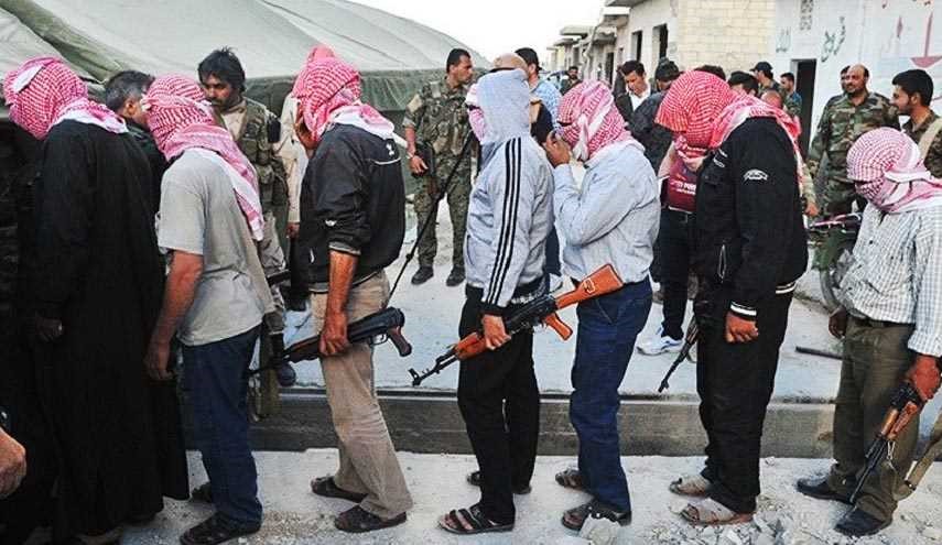 مئات المسلحين في ريف دمشق سلموا انفسهم