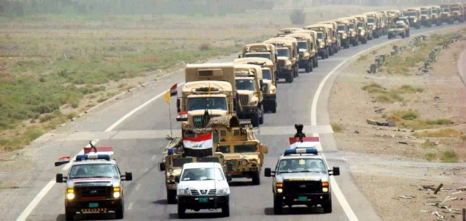 “La Bandera Iraquí es Izada Nuevamente en Mosul” 