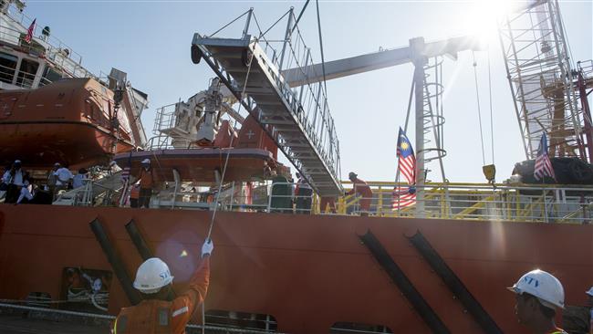 Malaysian ship with aid for Rohingya docks in Myanmar, greeted by protest