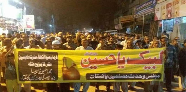 People hold protest against recent suicide bombing at Qalandar shrine