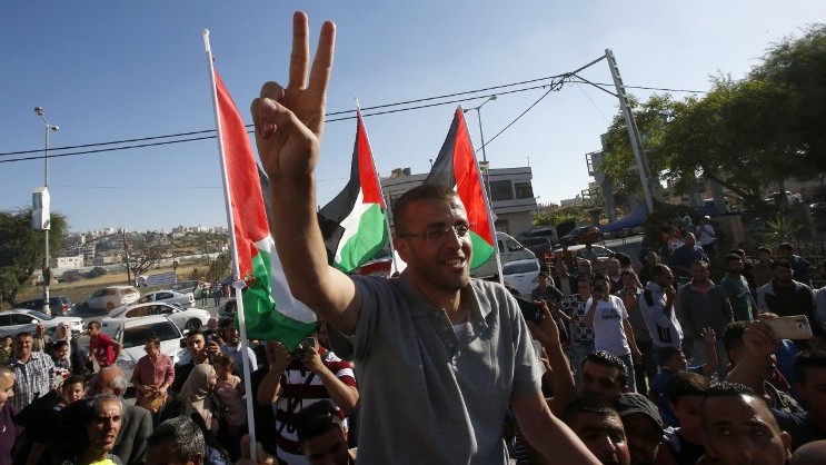 Palestinian journalist suspends hunger strike as Israel agrees his release