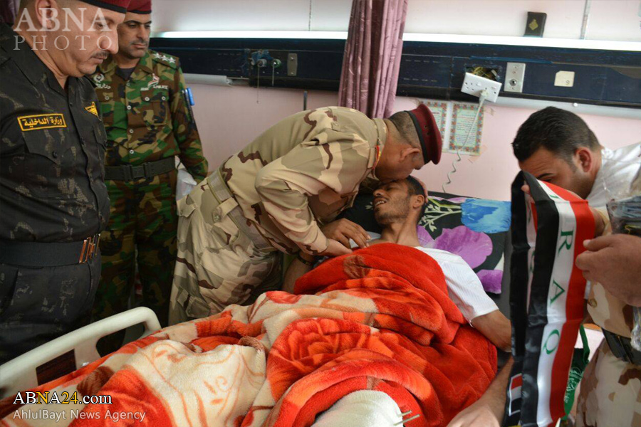 تقرير مصور/ قائد عمليات الفرات الأوسط يعود جرحى الحشد الشعبي 