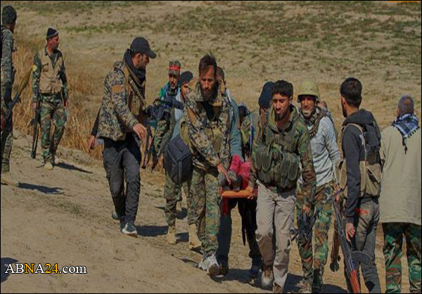 الحشد الشعبي ينقل 11 الف عائلة من مناطق ايمن الموصل الى مناطق آمنة