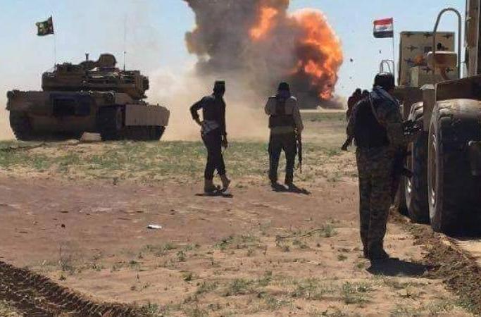 الحشد الشعبي يفجر سيارة مفخخة ويقتل من فيها بصد تعرض لداعش استهدف القرى المحررة في بادوش