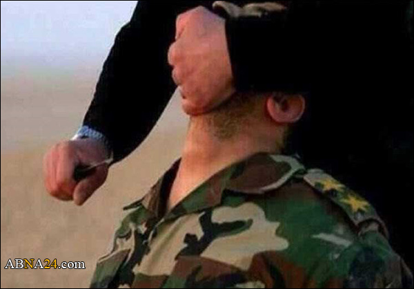 داعشي ذبح أكثر من 400 جندي سوري ووقع بيد الجيش السوري + (صورة)
