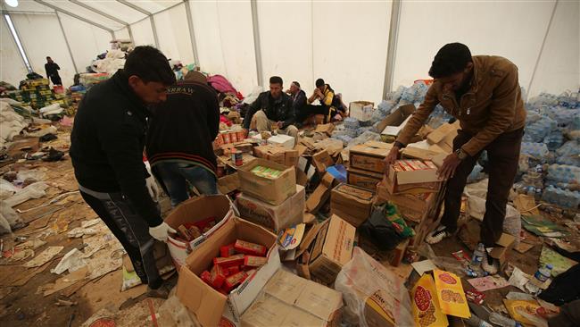 Hashd al-Sha’abi Shiite aid Sunni brothers in liberated Mosul areas
