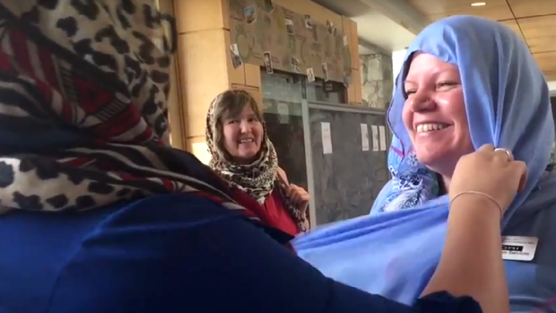 British women don Muslim headscarves at 'Hijab for a Day' event