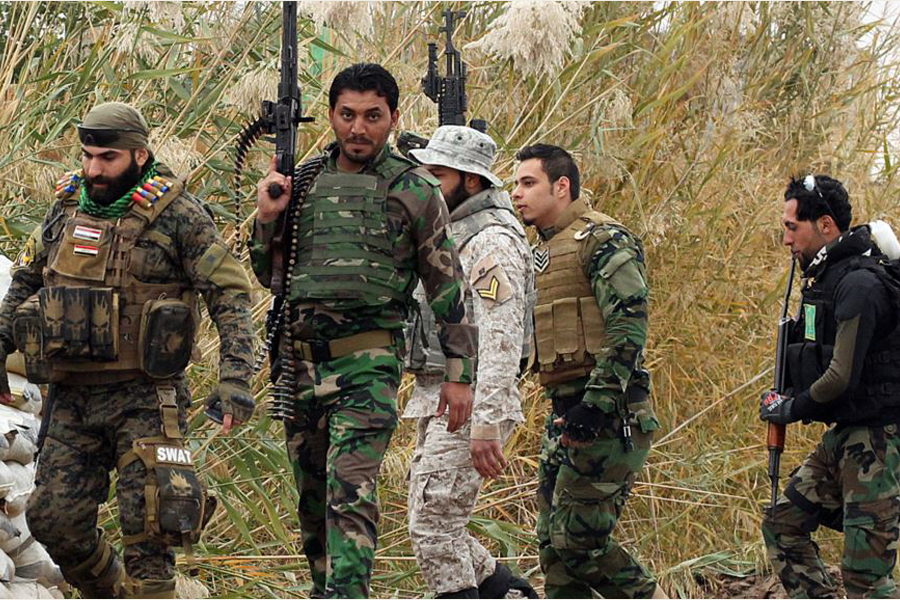اعتقال 12 انتحاريا في تكريت على يد الحشد الشعبي تسللوا من الموصل