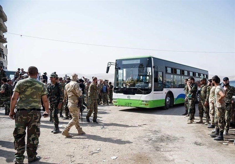 Syrian militants start leaving Damascus district