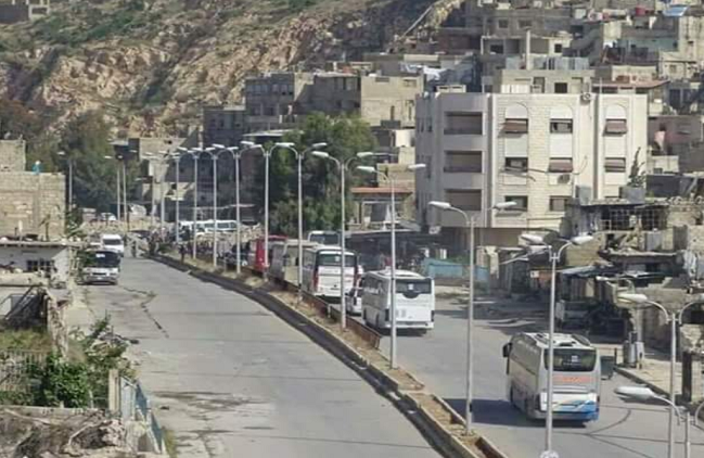 خروج 568 مسلحا من حي برزة بدمشق