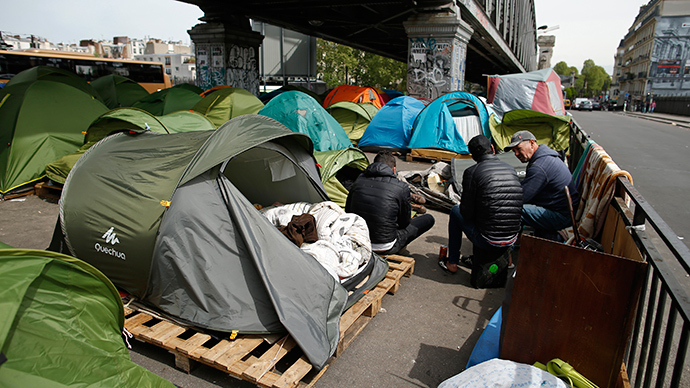 French police clear hundreds from makeshift refugee camp in Paris