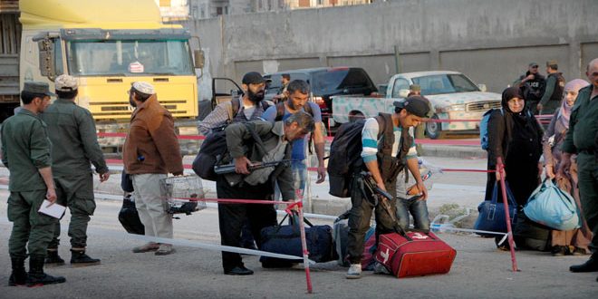 260 gunmen, family members leave al-Waer neighborhood