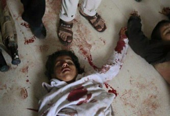 داعش الوحشي يعدم مدنيين بينهم طفلان ويضرم النيران في جثثهم بسوريا