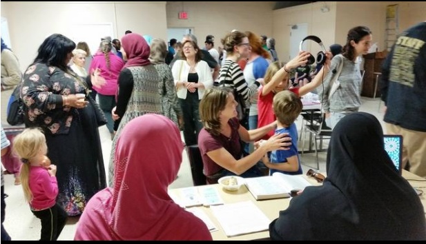 Open mosque in Rhode Island draws a smiling crowd