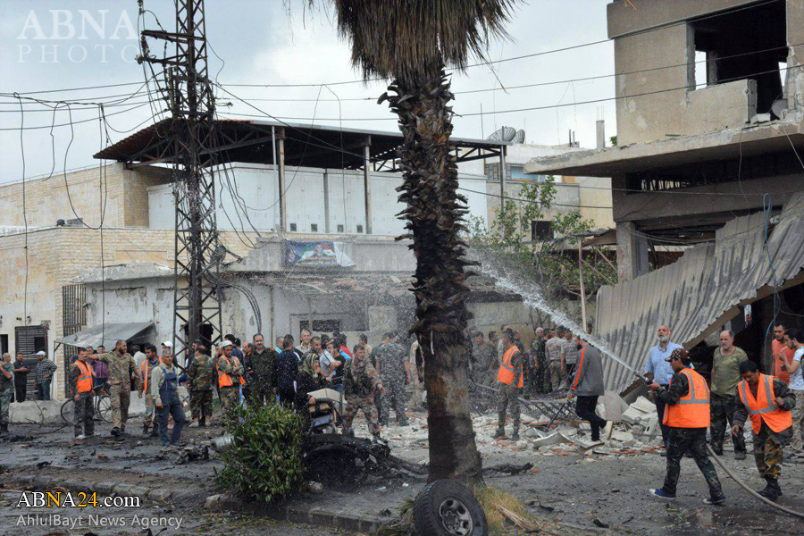 تقرير مصور/ داعش الوحشي يفجر سيارة مفخخة في حمص ويقتل ويصيب 18 شخصا