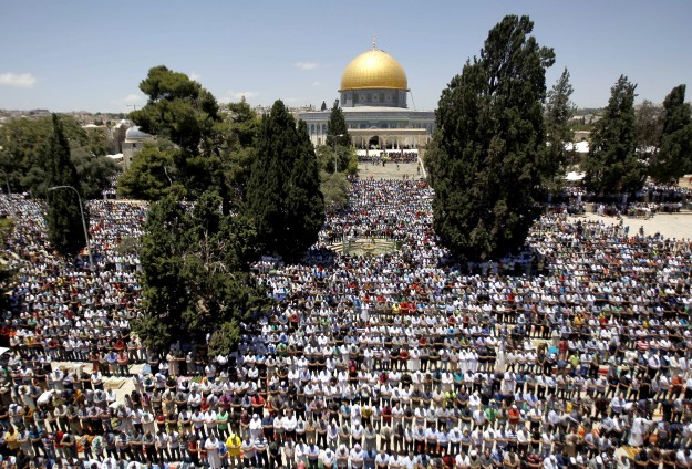 Palestinians attend Al-Aqsa Mosque for first Friday Prayers in Ramadan